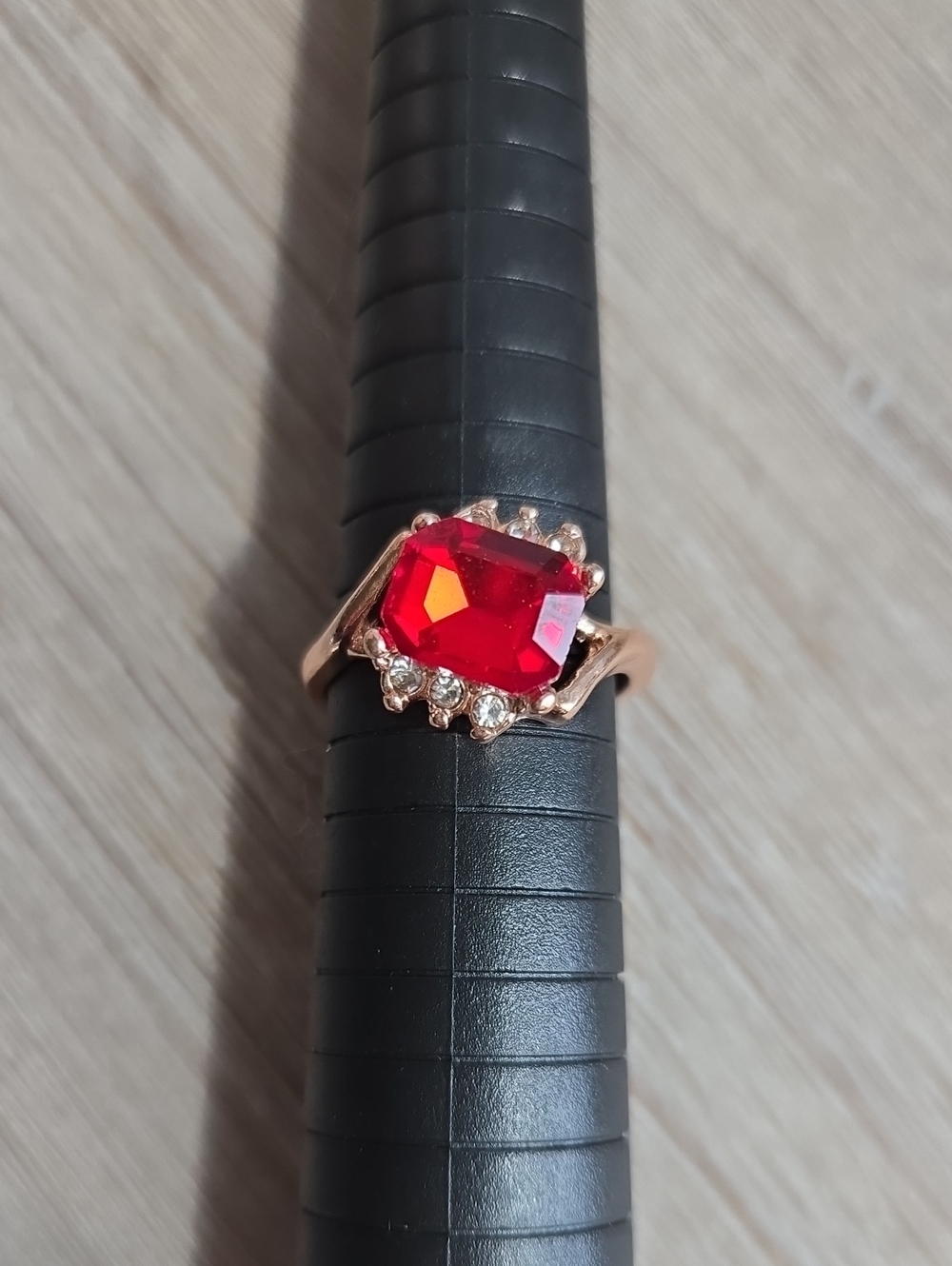 Gold-Plated Red Crystal Ring with Clear Accent Stones.Size 9.
